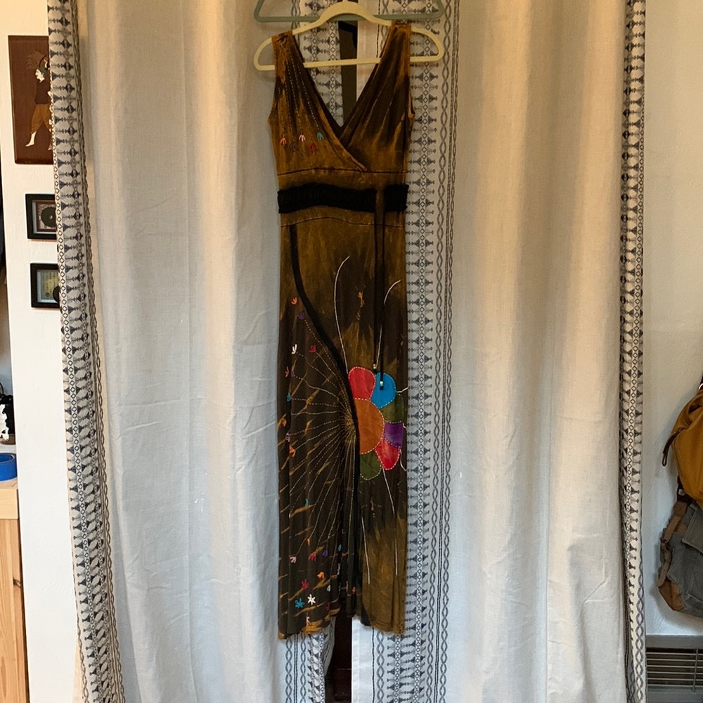 Rising international stitched dress.